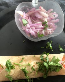 Wholesome breakfast burrito served with pickled onions Recipe