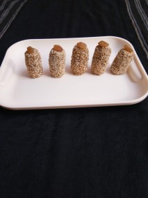Roasted Sesame Seeds Coated Sattu Peanut Powder Pinni Recipe