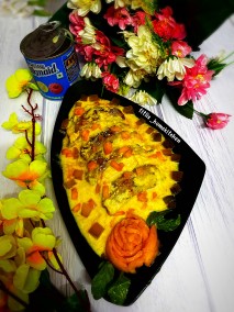 Malpoa with Mango glaze dunked in Mango Rabri Recipe