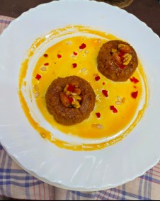 Besan delight with carmelized nuts in kesar syrup recipe